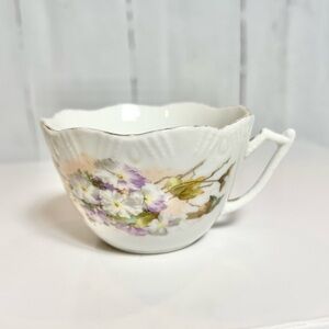 Vintage porcelain mustache cup with purple and white floral front